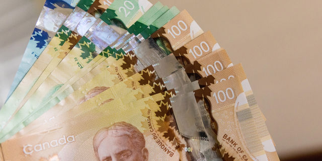 Negocie o dólar canadense com os dados econômicos