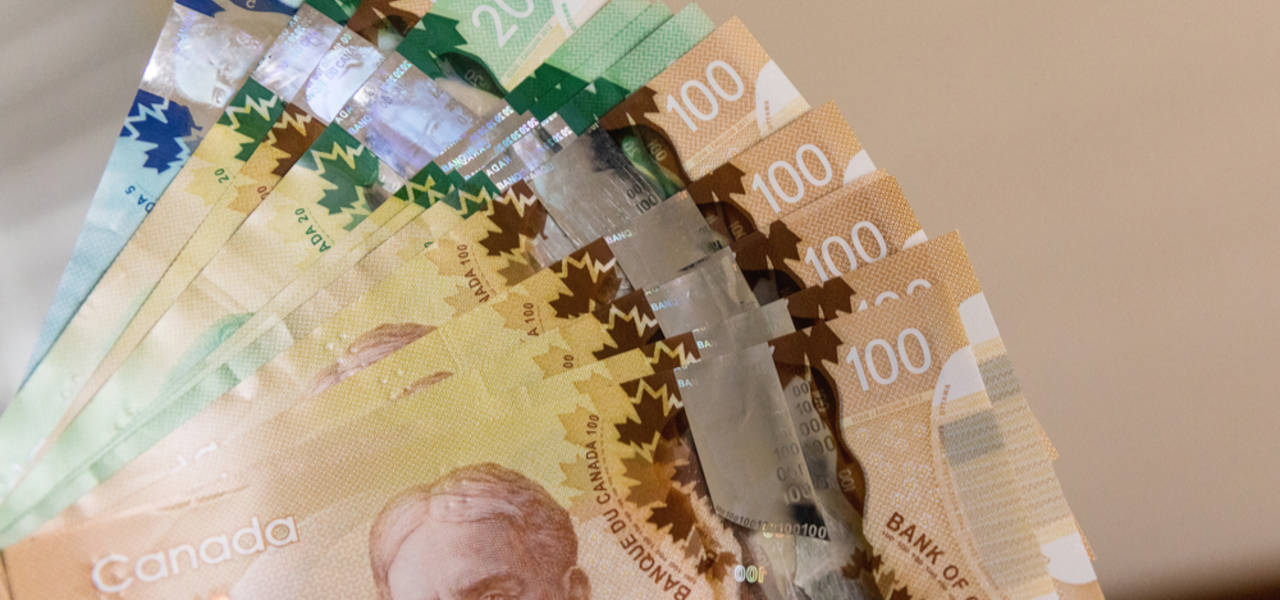 Negocie o dólar canadense com os dados econômicos