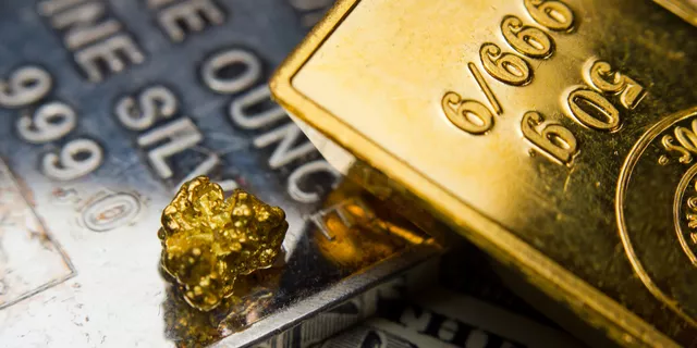 Dólar exerce forte pressão sobre o ouro 